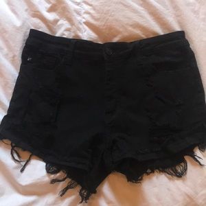 Distressed jean shorts by Ken Chan